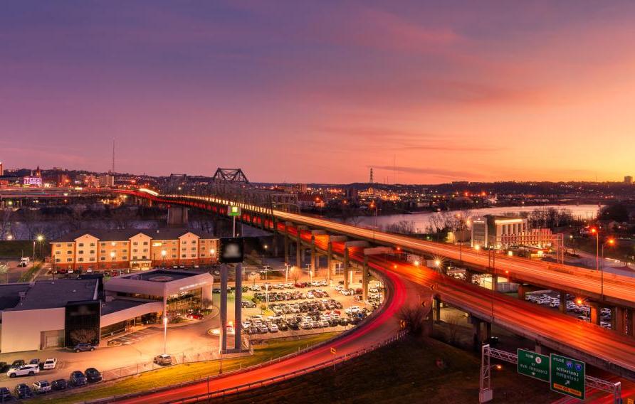 Highway interchange bridge at red dusk