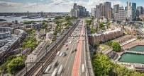 Sydney downtown traffic and aerial view of port and cityscape